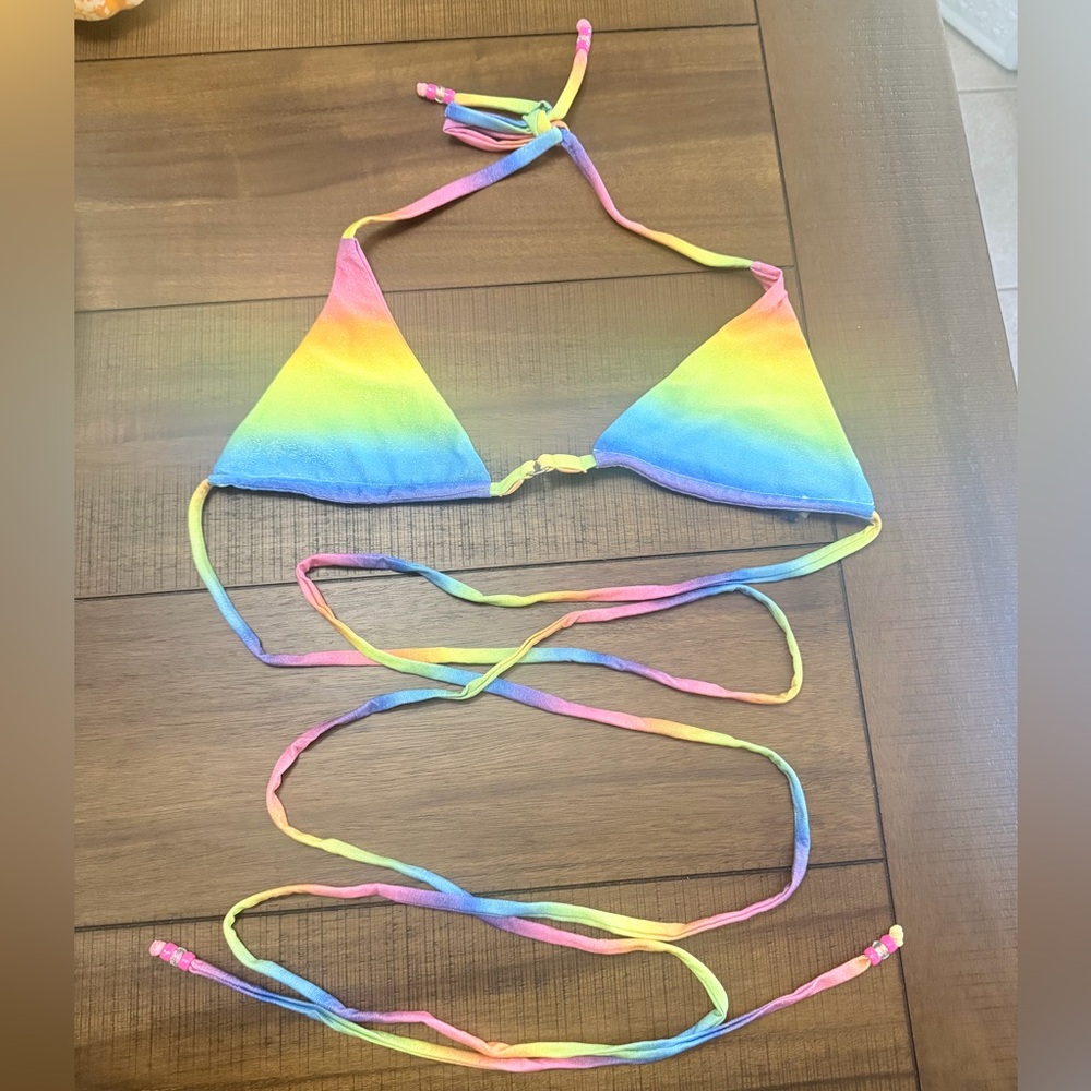 Never been worn or washed cute bikini top.